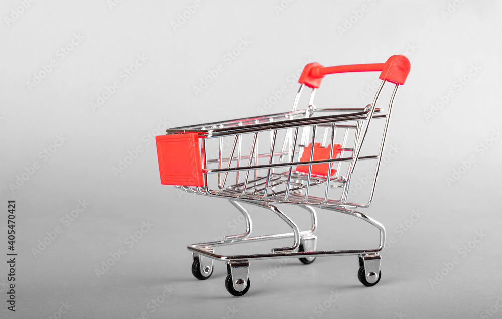  A side angle of miniature shopping cart.