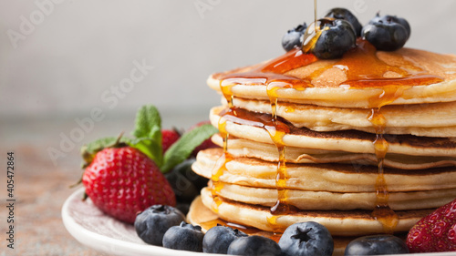 Stack of pancakes with berries