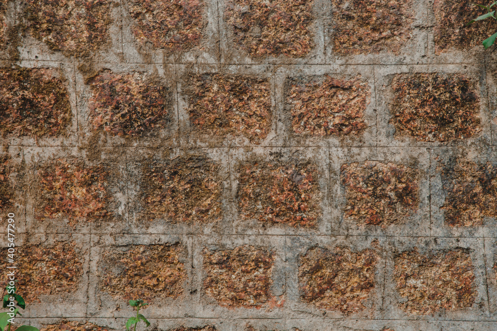 wall of square brown bricks wall of square brown bricks