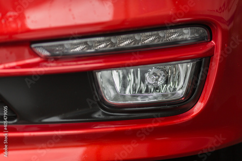 headlight of a red car