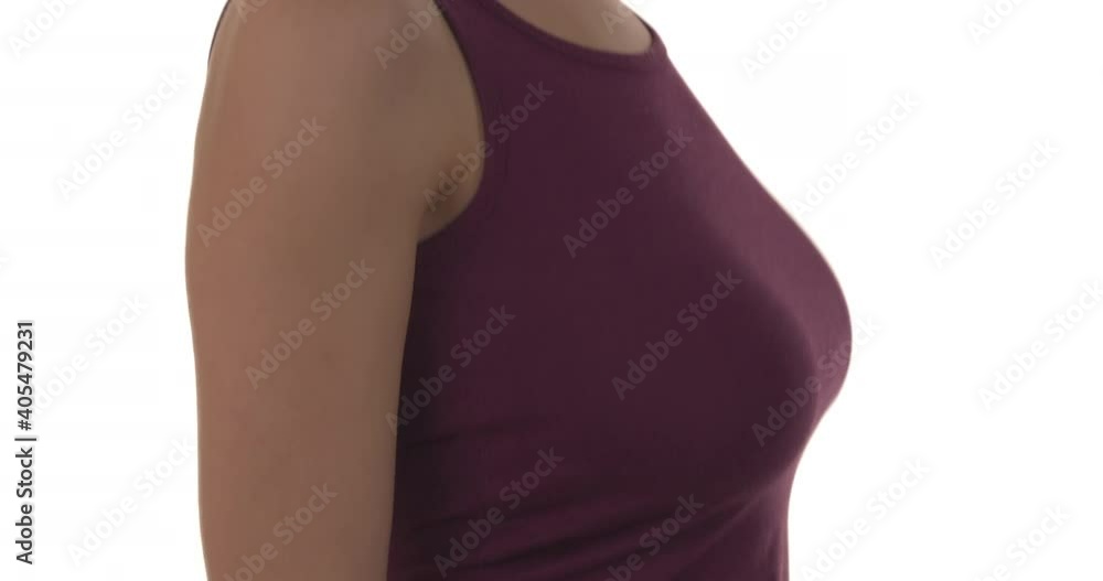 Close-up of young woman bouncing her large breasts. Isolated on white  background. Slow motion. Stock Video