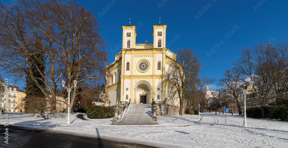 Roman Catholic Church of the Virgin Mary Assumption in winter with snow - small spa town Marianske Lazne (Marienbad) - Czech Republic (region Karlovy Vary)
