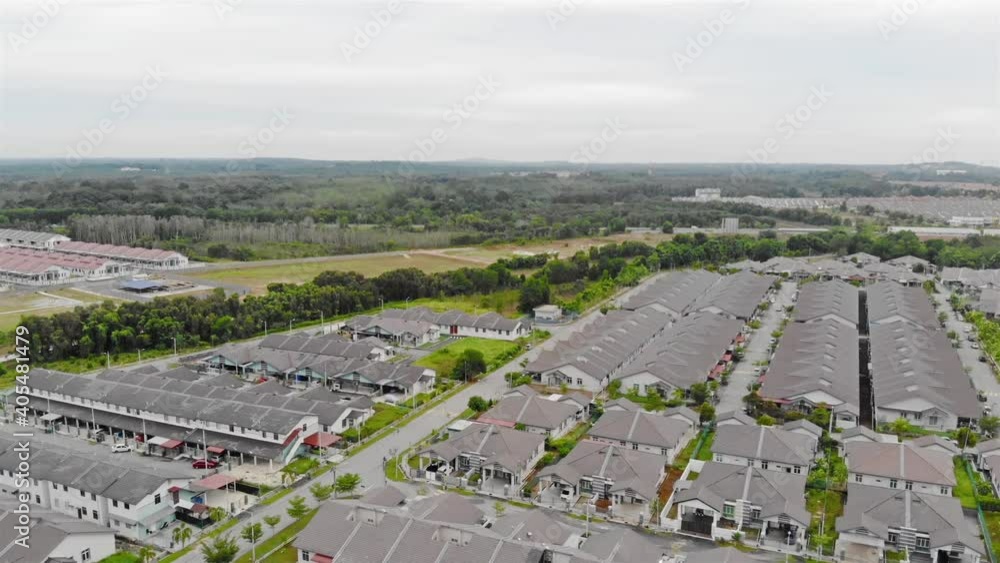 Large Land Of Housing In Melaka With Jungle In The Background On A Clear Day - Dolly Forward Large Land Of Housing In Melaka With Jungle In The Background On A Clear Day - Dolly Forward