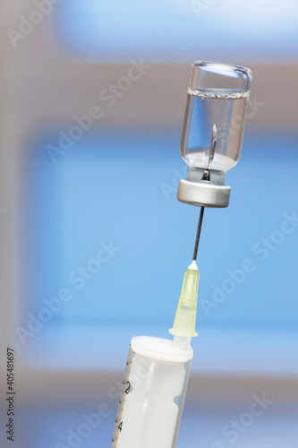 Extreme close-up of syringe and vaccine for covid-19