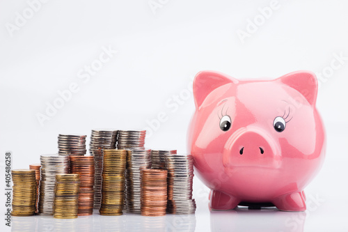 Pink Piggy Bank. Romanian currency, stack of coins photo