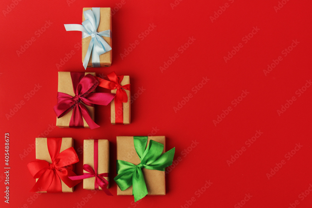 Gifts packed with craft paper and colorful satin ribbons Gifts packed with craft paper and colorful satin ribbons