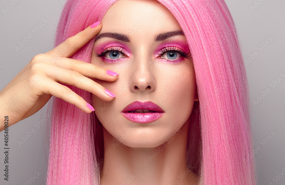 Beauty Fashion woman with Colorful Pink Dyed Hair. Girl with blue eyes, perfect Makeup and Hairstyle. Beautiful smiling model portrait, fashionable pink make up, hair. Skincare concept Beauty Fashion woman with Colorful Pink Dyed Hair. Girl with blue eyes, perfect Makeup and Hairstyle. Beautiful smiling model portrait, fashionable pink make up, hair. Skincare concept
