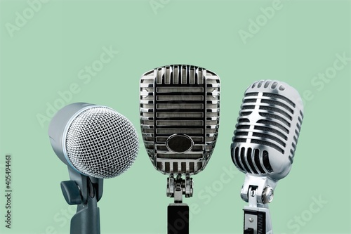 Retro style classic microphone on background