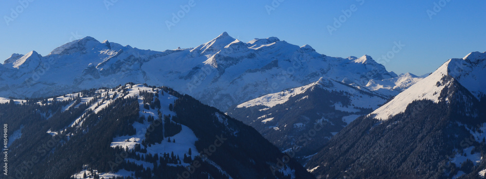 Distant view of the Diablerets mountain range in winter.