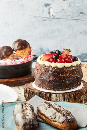 Black forest cake  Schwarzwald pie  dark chocolate and cherry dessert on a white wooden background.