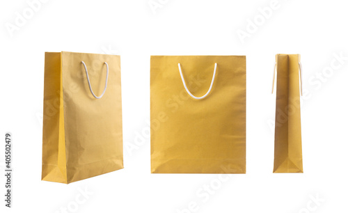 Brown folded paper bag with handles isolated on white background