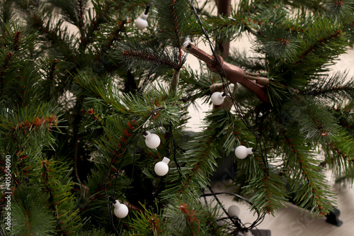 The holiday is over. Dismantling an artificial Christmas tree.