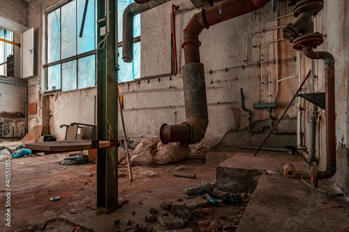 A decayed factory hall an abandoned industry area with natural decay