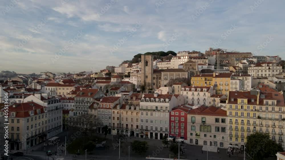 4K Lisbon Portugal Aerial drone travel video Alfama Neighborhood during a daily scenic view from above high fly. It is the most popular and touristic Neighborhood in Lisbon, Portugal. 4K Lisbon Portugal Aerial drone travel video Alfama Neighborhood during a daily scenic view from above high fly. It is the most popular and touristic Neighborhood in Lisbon, Portugal.
