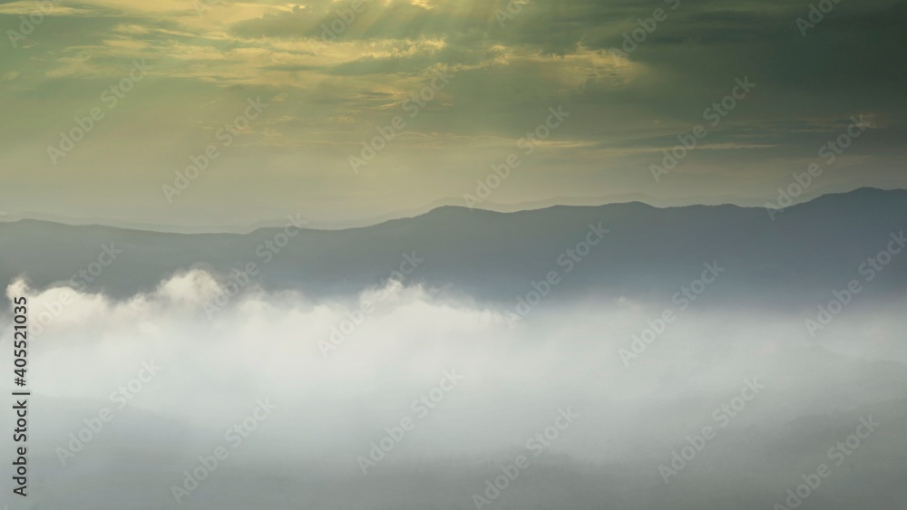 Mountain peaks above the clouds.