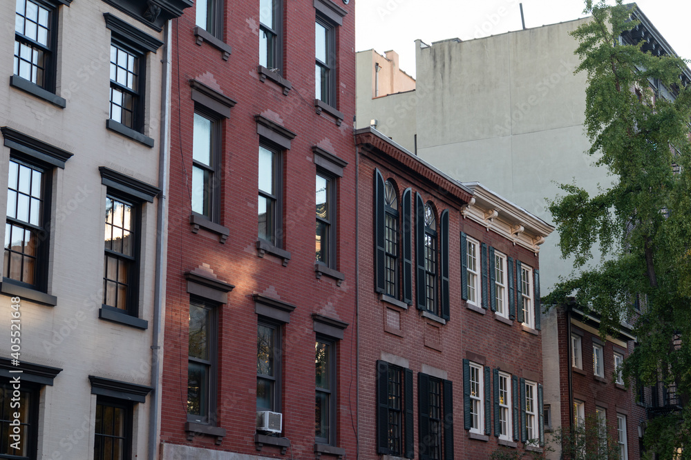 Row of Old Colorful Brick Apartment Buildings in Greenwich Village of New York City