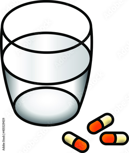 Three orange and cream pills with a glass of water.