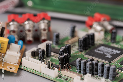 Slika na platnu Old circuit board of electronic device illustrating concept of planned obsolesce