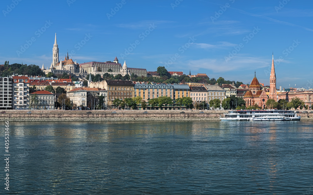 Budapest, Hungary. View on right bank of Danube with Matthias Church and Fisherman's Bastion on Castle Hill and Calvinist Church faced to Danube.