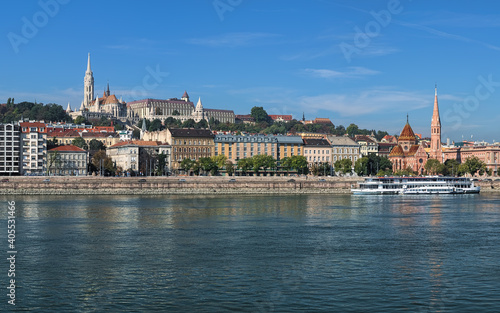 Budapest, Hungary. View on right bank of Danube with Matthias Church and Fisherman's Bastion on Castle Hill and Calvinist Church faced to Danube.