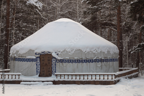 national nomadic house - yurt, in the winter in the forest