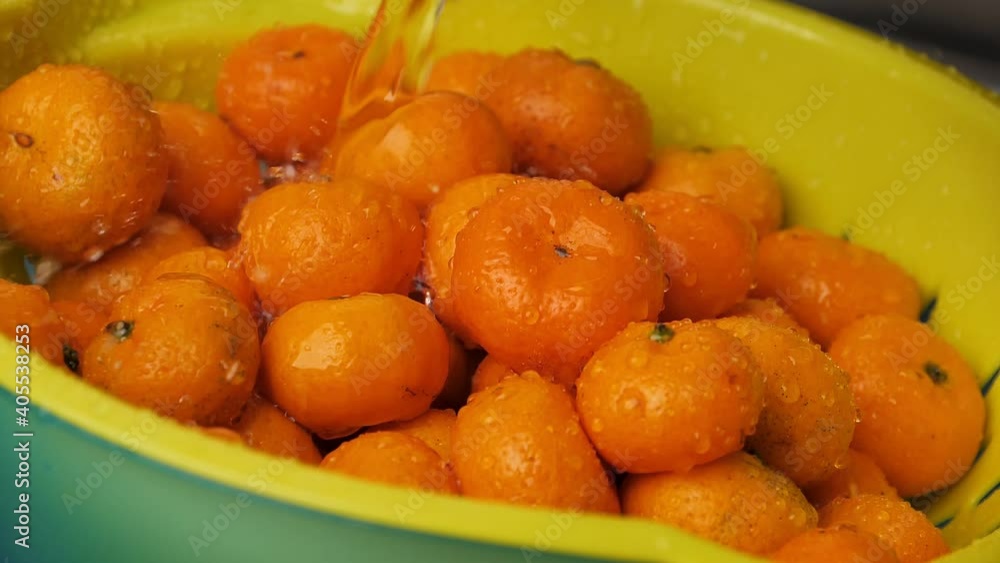 Fresh mandarin oranges fruit or tangerines in basket. Fresh mandarin oranges fruit or tangerines in basket.