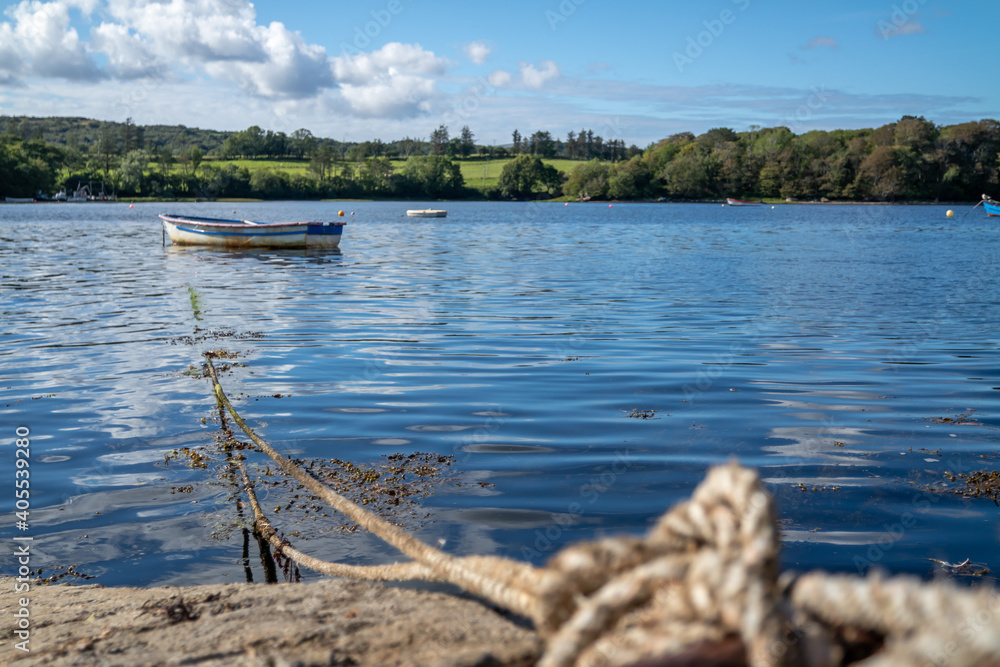 Rowing boat at the pier in Bruckless in County Donegal - Ireland. Rowing boat at the pier in Bruckless in County Donegal - Ireland.