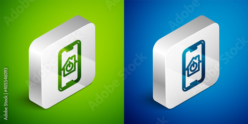 Isometric line Mobile phone with smart home icon isolated on green and blue background. Remote control. Silver square button. Vector.