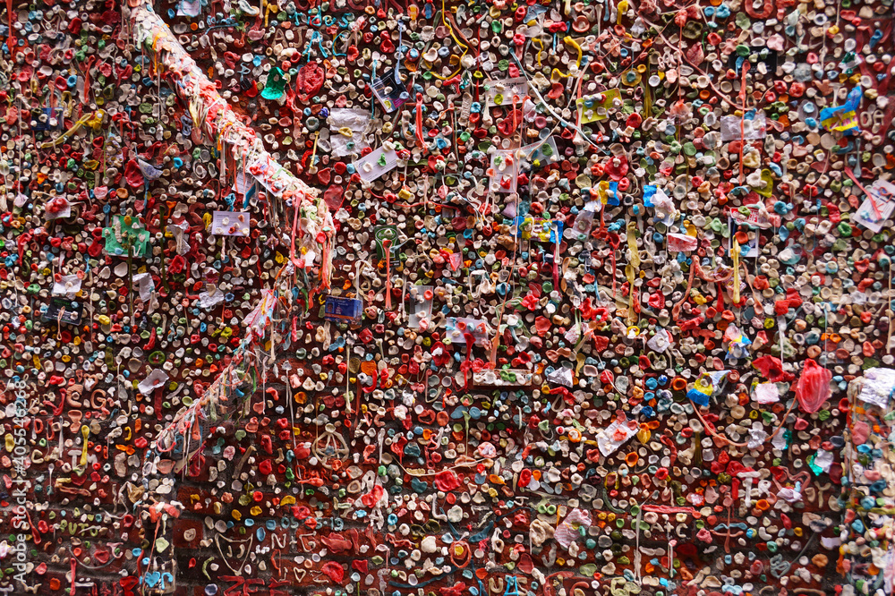 Chewing gums stuck to the wall. One of the tourist attractions  in Post Alley in Downtown Seattle. Gum wall.