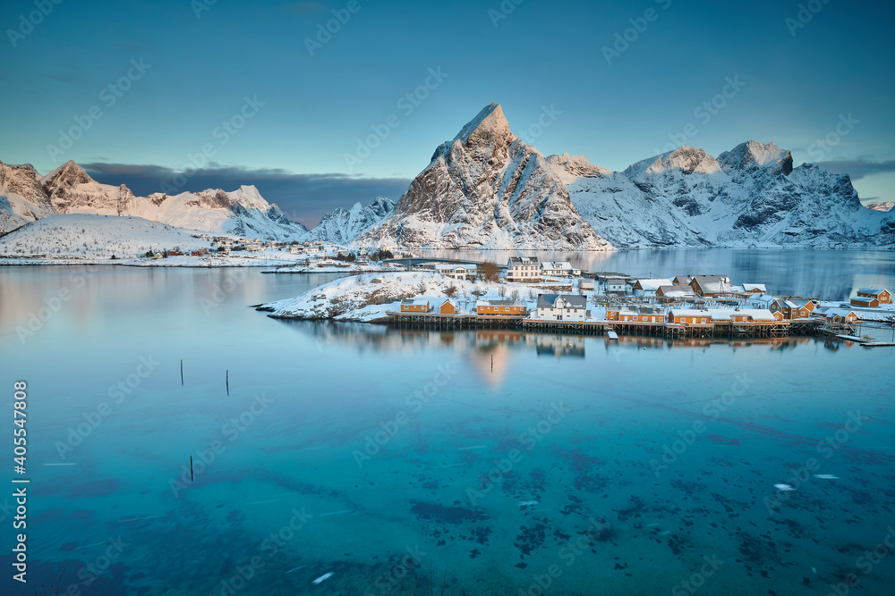 A view of the village of Sakrisoy in the Lofoten Islands in Norway at sunrise A view of the village of Sakrisoy in the Lofoten Islands in Norway at sunrise