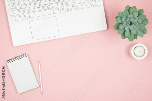 Wallpaper Mural Flat lay home office desk. Women workspace with laptop, notebook, pen on pink background. Top view feminine background Torontodigital.ca