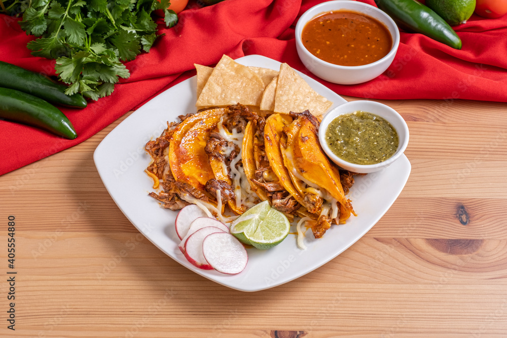 Birria tacos. Authentic Mexican street tacos made with steak, corn