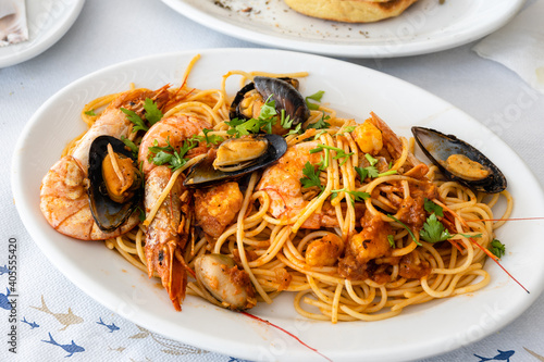 Pasta with grilled seafood. Traditional Greek dish.