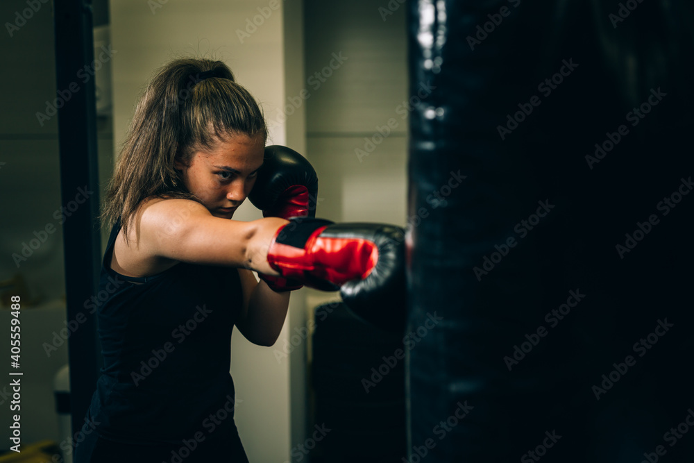 young woman has boxing training