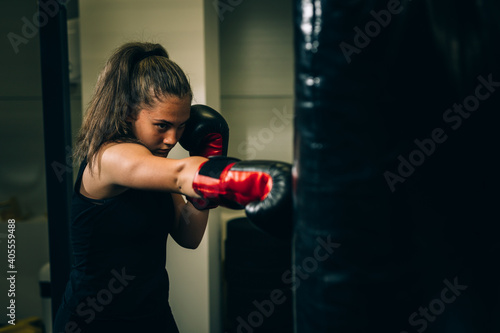 young woman has boxing training © cherryandbees