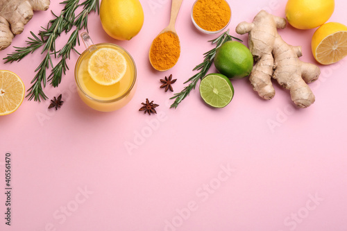 Flat lay composition with immunity boosting drink on pink background. Space for text