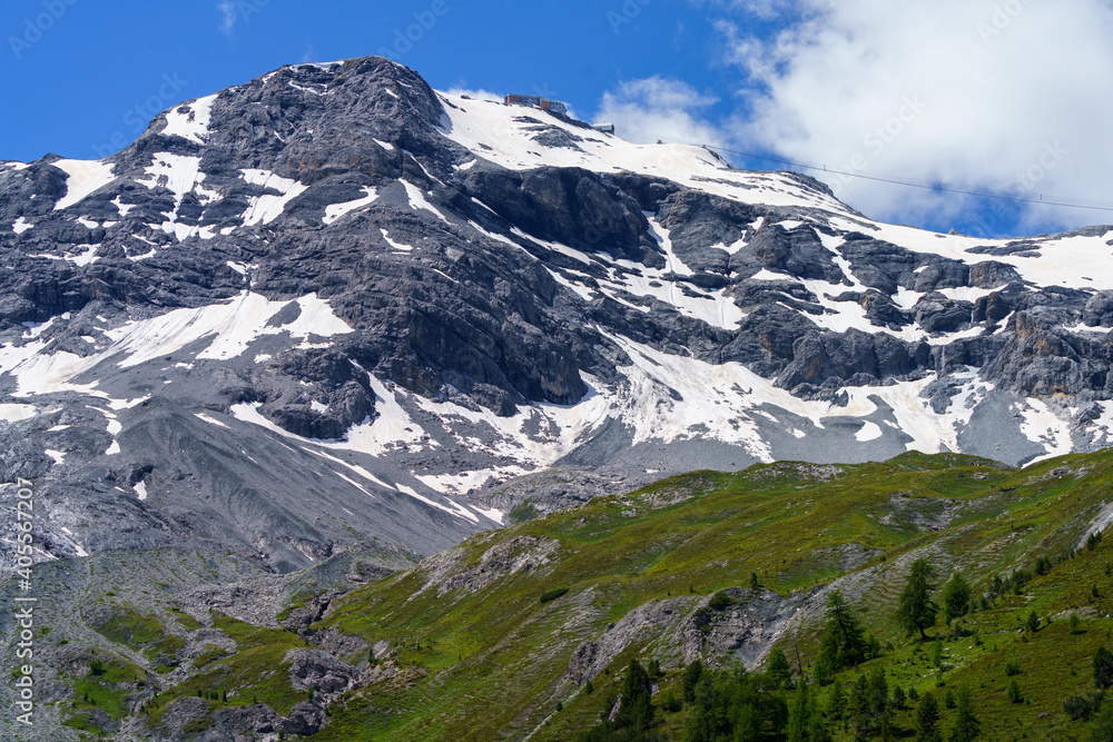 Mountain landscape along the road to Stelvio pass at summer. Glacier Mountain landscape along the road to Stelvio pass at summer. Glacier