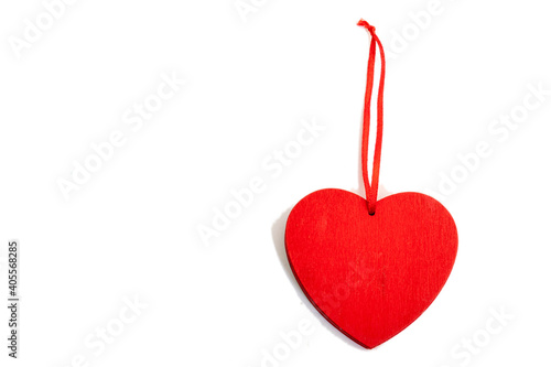 Valentine day wooden red heart on white background.