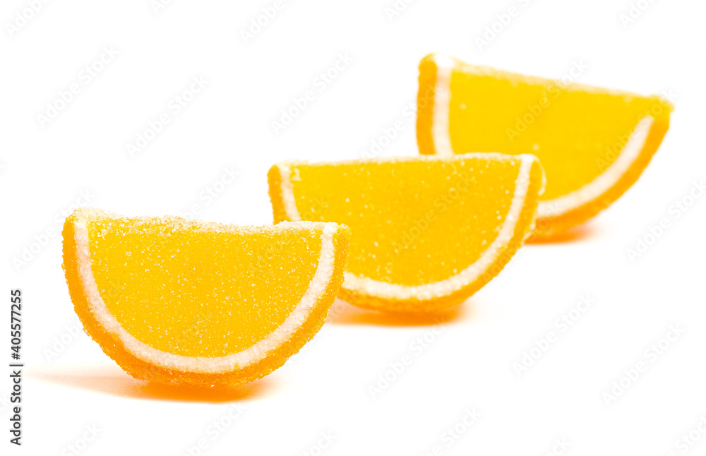 Orange Candy Fruit Slice on a White Background Orange Candy Fruit Slice on a White Background