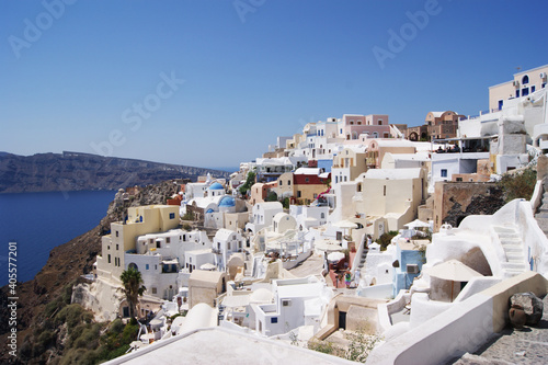 Beautoful view of white town Oia on Santorini island in Greece. Town is situated on volcano calderra. Famous touristic place
