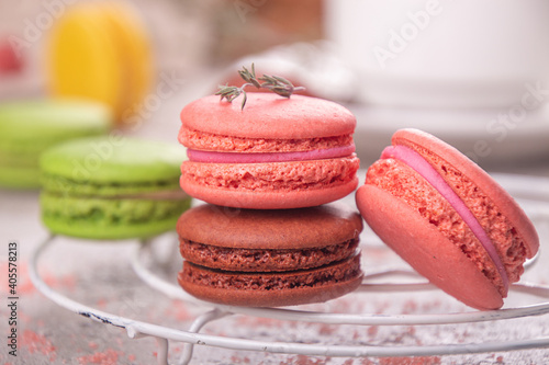 colorful macarons over on black background.  Selective focus photo