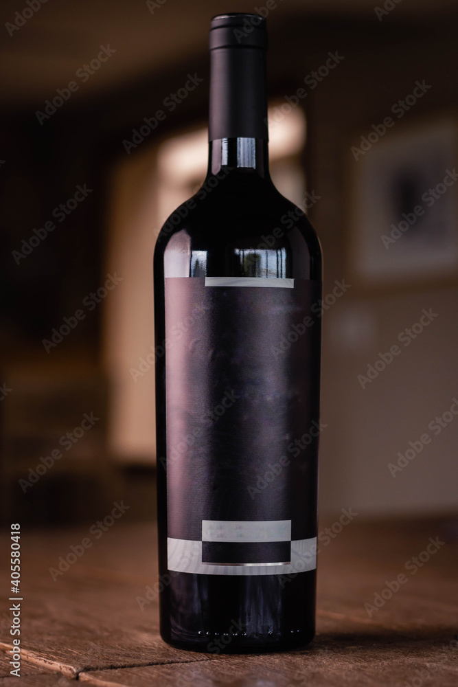 close-up of wine bottle with space for text on the label on wooden base cordoba argentina