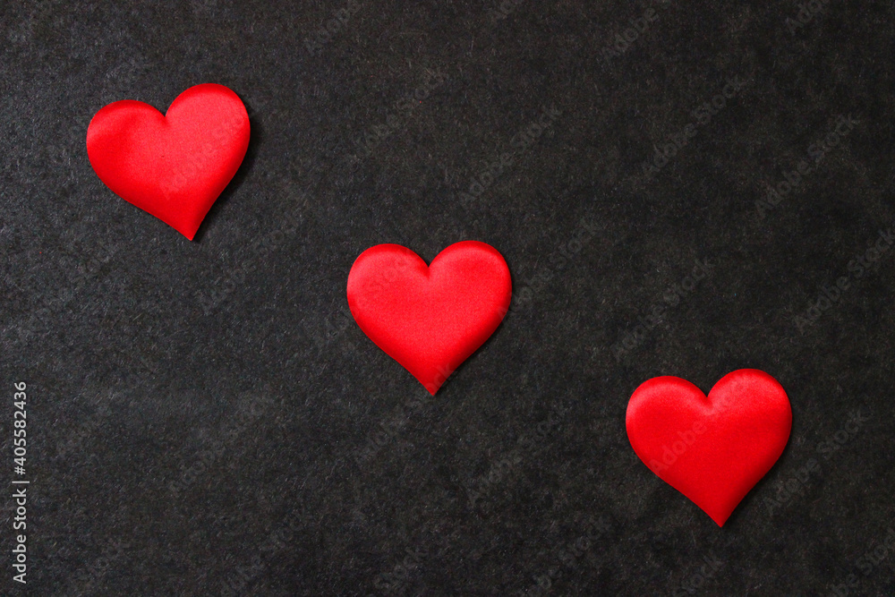 St. Valentine day background. Red heart on dark background St. Valentine day background. Red heart on dark background