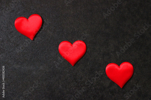 St. Valentine day background. Red heart on dark background