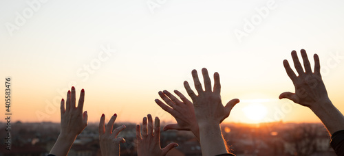 Hands up at the sunset