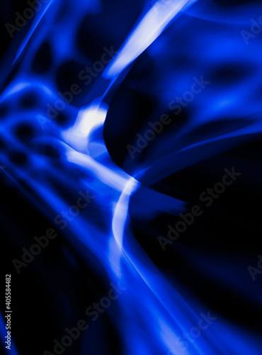 Abstract blue lines on a black background
