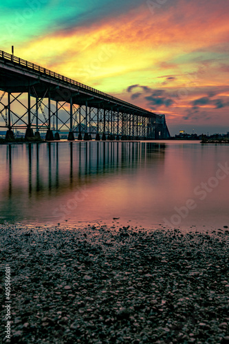 Fotografie A very colorful sunset over Calcasieu River Bridge in Lake Charles, Louisiana