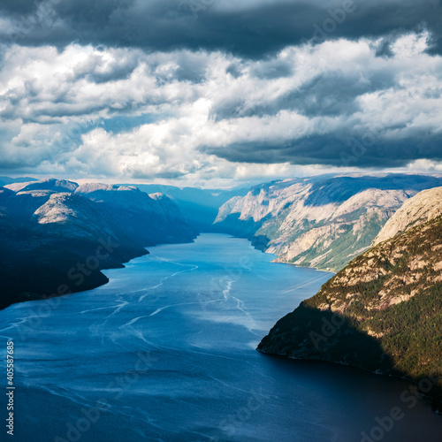 Misty morning on Preikestolen (pulpit-rock) - famous tourist attraction in the municipality of Forsand in Rogaland county, Norway photo