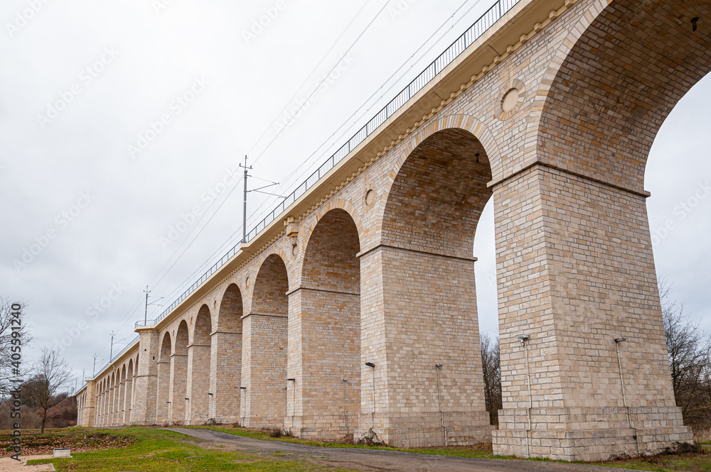 Rail viaduct over valley with river Bobr in Boleslawiec, Poland. Entirely built of stone in 1846. One of the longest masonry bridges of its type in Europe.  