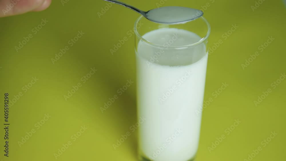 Kefir Sample Collection The expert makes a sample of dairy products, examination of milk for ...
